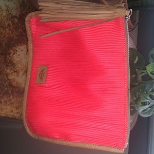 Consuela electric orange/coral mesh bag with zipper.